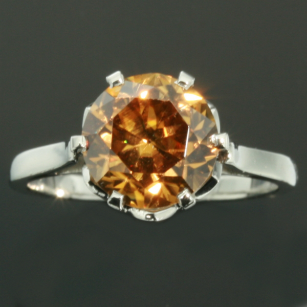 Art Deco platinum engagement ring set with warm colored hyacint - natural zirkon